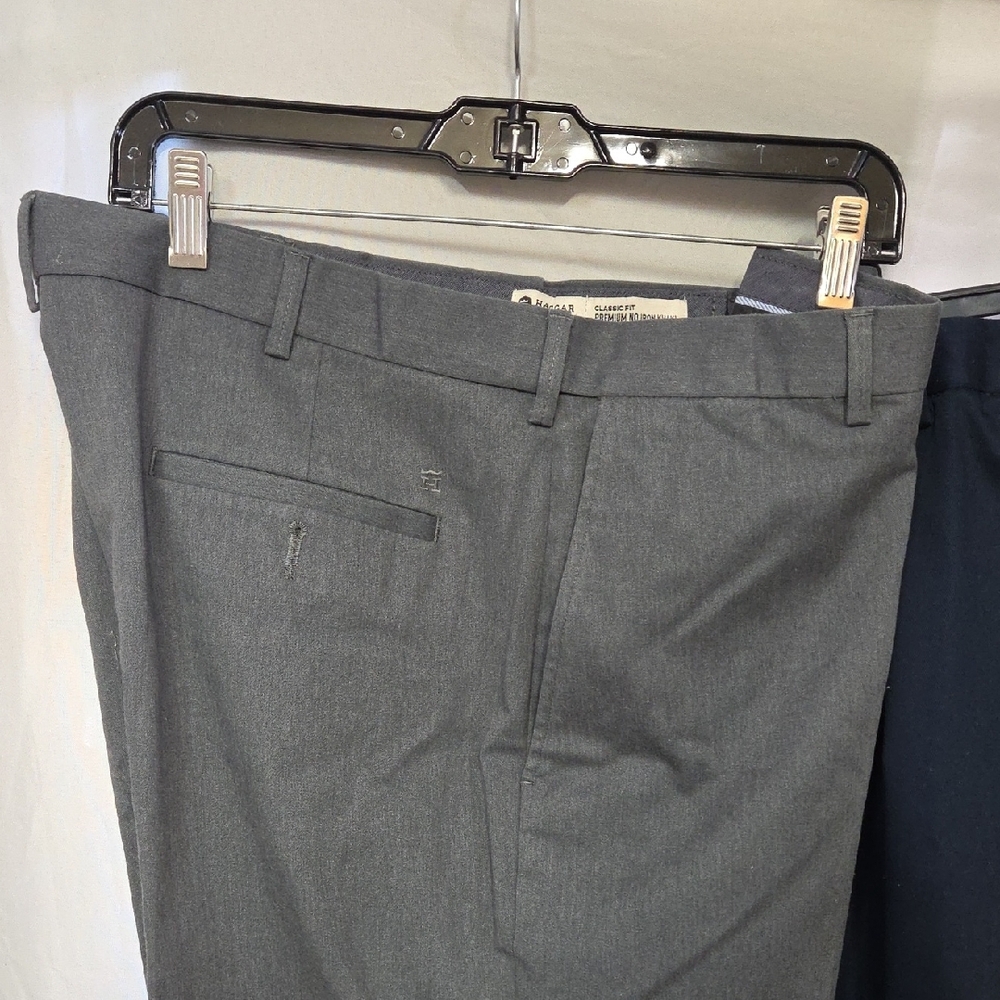 3 Pair Haggar dress pants. Available in charcoal, navy, and black. 36x29 - Picture 2 of 13